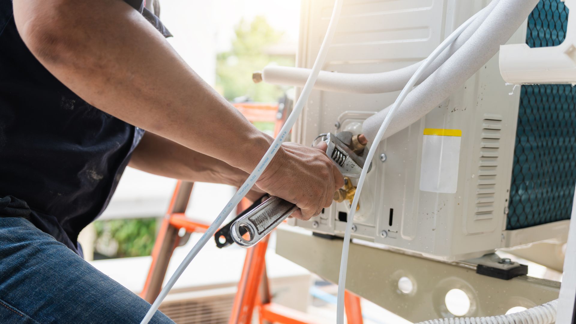 Falls 2 Falls tech servicing refrigerant lines on a Chubbuck, ID air conditioner